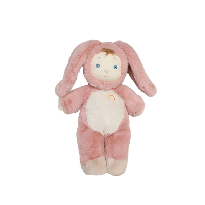 Cozy Dinkums pink bunny plush doll with floppy ears, soft cream belly and feet, blue eyes, and a tiny rainbow detail, a cuddly gift for babies and kids