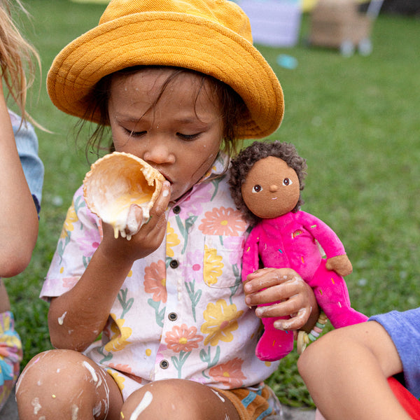 Limited-edition, palm sized, collectable kids plush toy. Sadie Sprinkles is a pink, strawberry donut weighted plush toy in a velvet onsie, perfect for imaginative kids play.
