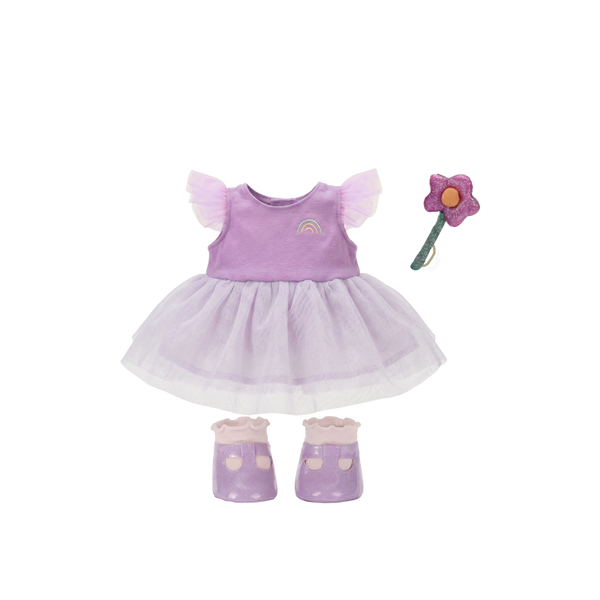 Purple dress with matching shoes and a pink wand on a white background