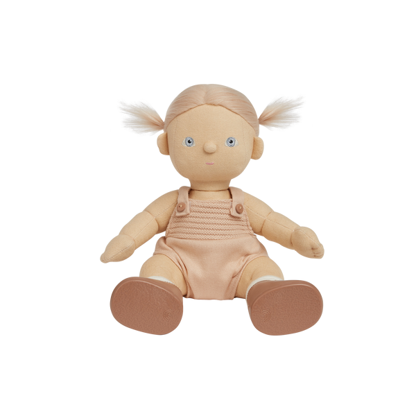 Dinkum Dolls Petal doll seated with blonde pigtails, embroidered facial features, and peach knitted overalls, ready for cuddles and imaginative play for kids