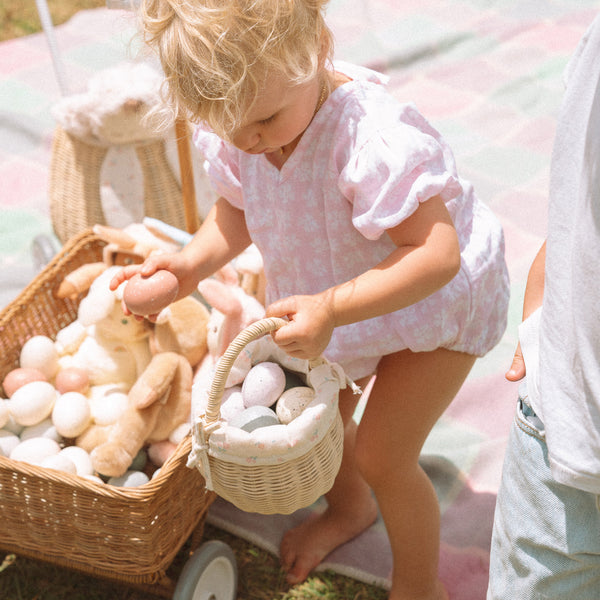 Rattan basket with printed flower lining, perfect for kids to carry their favorourite toys as well. This woven rattan basket can also be used as a home décor storage solution for bedrooms or nurseries.