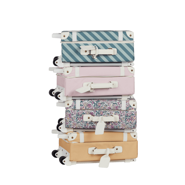 Stylish kids travel suitcase in blue striped design. Perfect for kids' travel, featuring a durable, lightweight build and eco-friendly materials. Made from recycled plastic bottles.