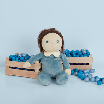 A limited-edition palm-sized plush toy, perfectly weighted in all the right places, and outfitted in a snuggly plush velvety blueberry suit.