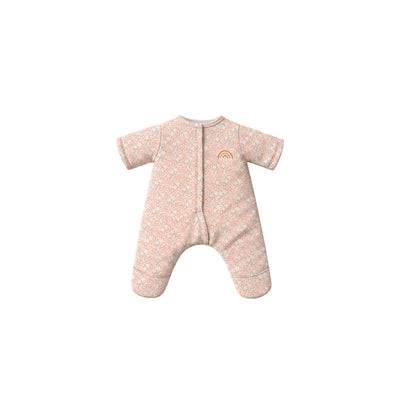 Pink baby snowsuit with rainbow design on a white background