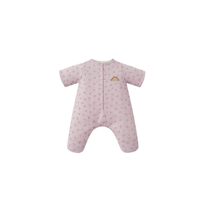 Pink baby onesie with rainbow design on a white background