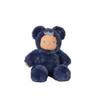 Blueberry Bear plush doll with navy blue fur, a soft tan face, gray hair tuft, rounded ears, and teal collar, seated against a white background by Dinkum Dolls by Olli Ella