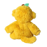 Back view of a soft yellow Mango Monkey plush doll with rounded ears, fuzzy texture, a long tail, and a green leaf detail by Dinkum Dolls by Olli Ella
