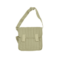 Sage quilted doll changing bag with an adjustable shoulder strap and front flap pockets from the Dinkum Dolls Carrie Convertible Changing Set