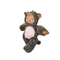 Plush toy resembling a dragon with a transparent background