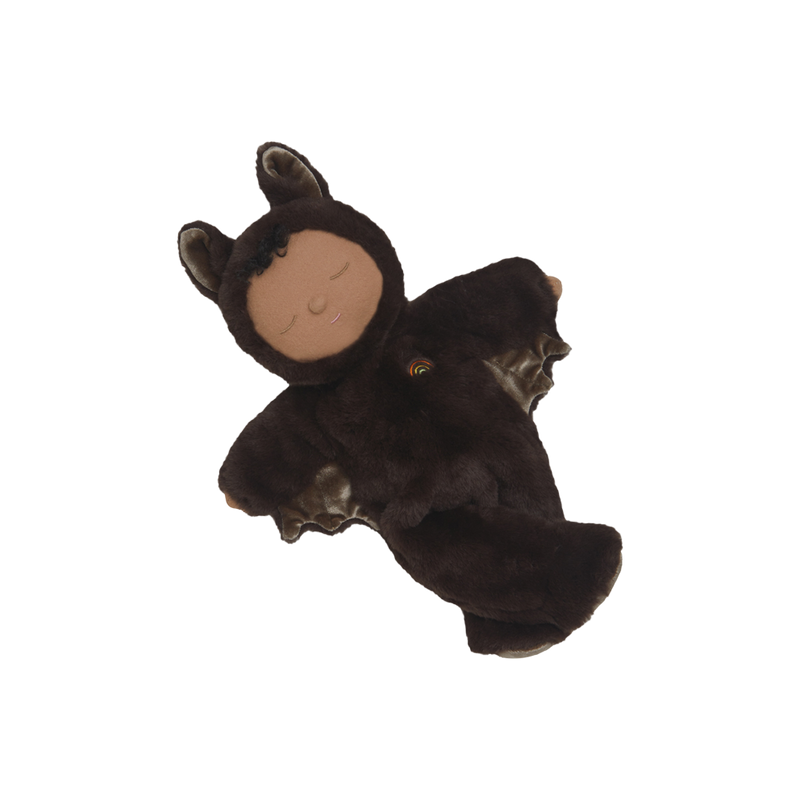 Cozy Dinkums Bat Ozzie plush toy with soft dark brown fur, outstretched wings, pointed ears, embroidered sleepy eyes, and a gentle smile
