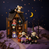 Halloween themed display of Cozy Dinkum dolls and plush toys in a moonlit woodland scene, featuring Nox Cat by Dinkum Dolls by Olli Ella on the rooftop