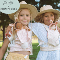 This soft, easter-themed pink doll carrier features adjustable straps and a snug fit, ideal for kids to tote their dolls comfortably. Perfect bunny-themed doll accessory, plush carrier for toddlers.