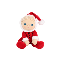 A plush baby doll dressed in a red Santa suit with white faux-fur trim, a red Santa hat with a white pom-pom, and blonde hair, seated against a plain white background.