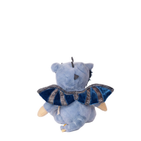 Plush toy bat with a blue and brown wing design on a white background