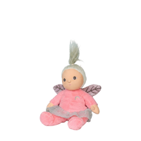 Plush toy fairy with pink outfit and wings on a white background