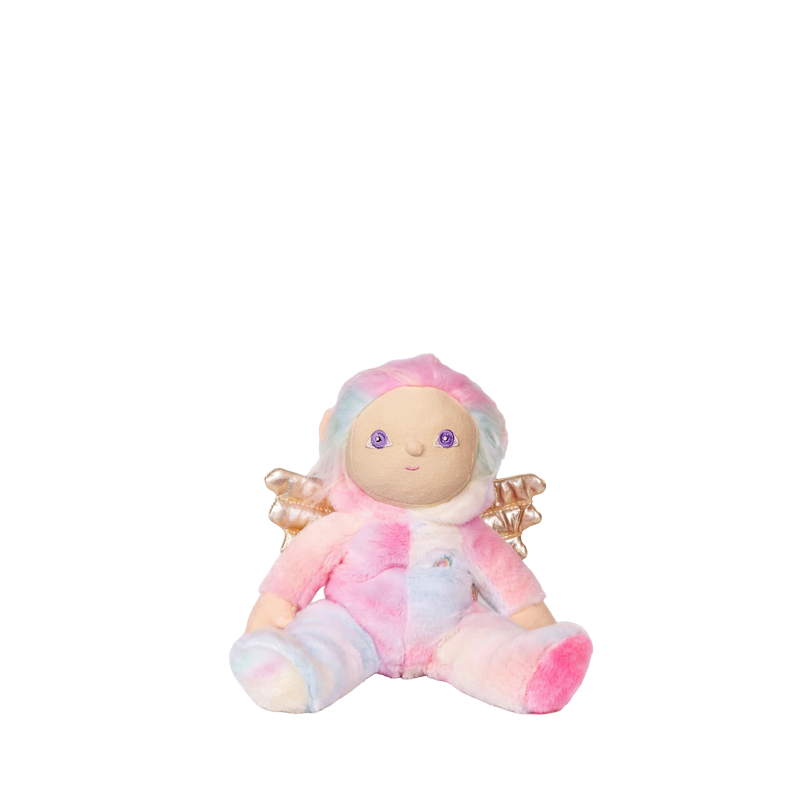 Soft pastel pink Dinky Dinkums unicorn doll with a pale rainbow belly, golden wings, rosy cheeks, and a cozy hooded outfit for cuddly playtime and gifting