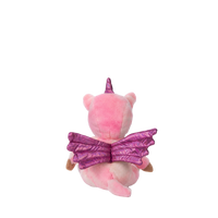 Pink plush toy with purple wings and horn on a white background