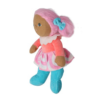 Dinky Dinkum Lottie Lollipop doll from Dinkum Dolls by Olli Ella with pink hair, turquoise bow, coral top, candy stripe skirt and blue boots