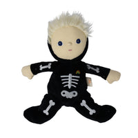 Dinky Dinkum Scully Skeleton doll in a black skeleton costume with bone details, soft blond hair, and a friendly face by Dinkum Dolls by Olli Ella