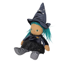 Winnie Witch doll with teal hair, pointed moon and star hat, black dress, and striped leggings from Dinkum Dolls by Olli Ella