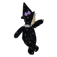 Black plush witch doll with silver stars, pointed hat, purple bow, and soft limbs from Dinkum Dolls by Olli Ella; a sweet Dozy Dinkum toy for children