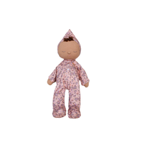 Stuffed doll in a floral outfit on a white background