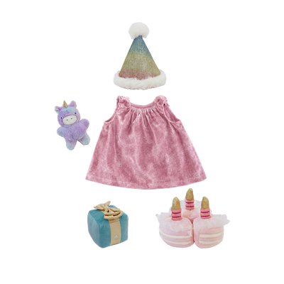 Set of children's items including a pink dress, Santa hat, plush toy, gift box, and shoes on a white background.