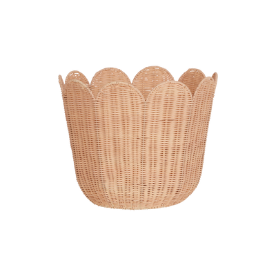 Seashell pink rattan tulip basket with a scalloped flower-shaped rim, ideal for stylish home storage and nursery decor by Olli Ella Nursery