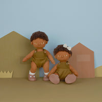 Brown afro haired, posable doll for kids. Snuggle them, dress them up and style their hair. Each Doll comes with its own removable gender-neutral outfit, socks, nappy, and shoes, perfect for interactive doll play.