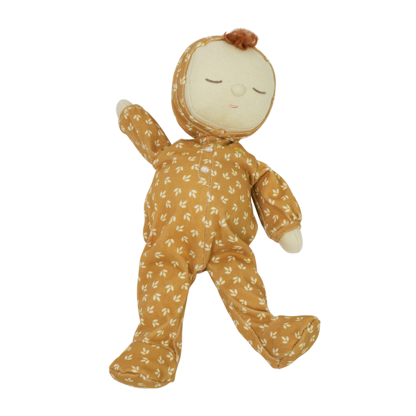 Dozy Dinkum doll with tan velvety onsie outfit. Perfectly weighted doll for calm. Plush doll with red hair, perfect for cuddling and interactive doll play.