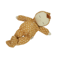 Dozy Dinkum doll with tan velvety onsie outfit. Perfectly weighted doll for calm. Plush doll with red hair, perfect for cuddling and interactive doll play.