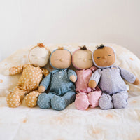 Gender-neutral posable plush doll with tan coloured velvety onsie outfit. Perfectly weighted for cuddles and bedtime. Suitable toy from birth.