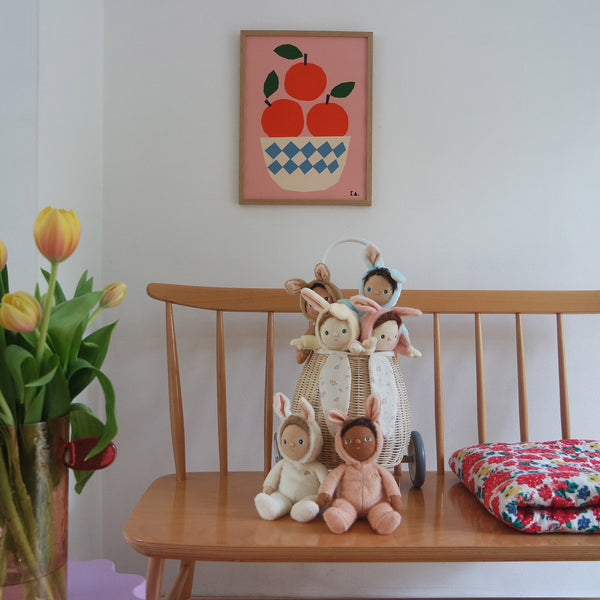 A soft, cuddly plush bunny toy with a apricot-colored coat, perfect for small hands and imaginative play. Perfectly weighted and collectable easter-themed plush toy.