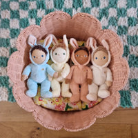 A soft, cuddly plush bunny toy with a baby blue-colored coat, perfect for small hands and imaginative play. Perfectly weighted and collectable easter-themed plush toy.