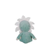 Plush toy resembling a flower with a light blue center on a white background
