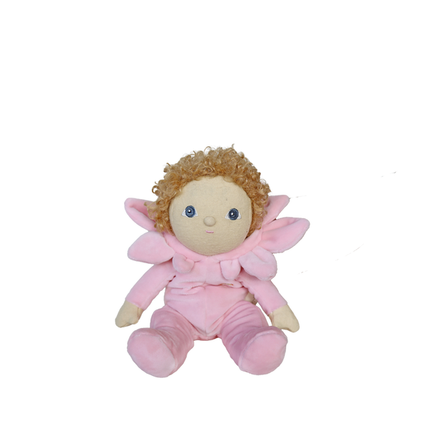 Plush toy fairy with pink outfit and curly hair on a white background