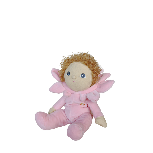 Plush toy fairy with pink outfit and curly hair on a white background