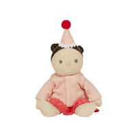 cute sitting doll with pink cardigan and polka dot dress