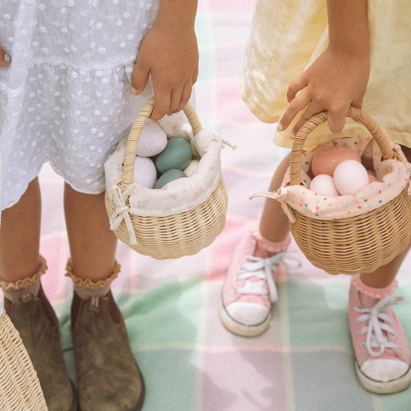 Easter-themed handwoven rattan basket with flower fabric lining. Designed for kids to carry their favourite toys and trinkets, forage on outdoor adventures or as a home décor storage solution.