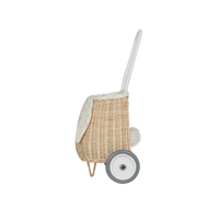 Rattan bunny luggy basket for kids with floral Pansy lining, floppy ears, two wheels and a pull handle by Olli Ella Kids Rattan