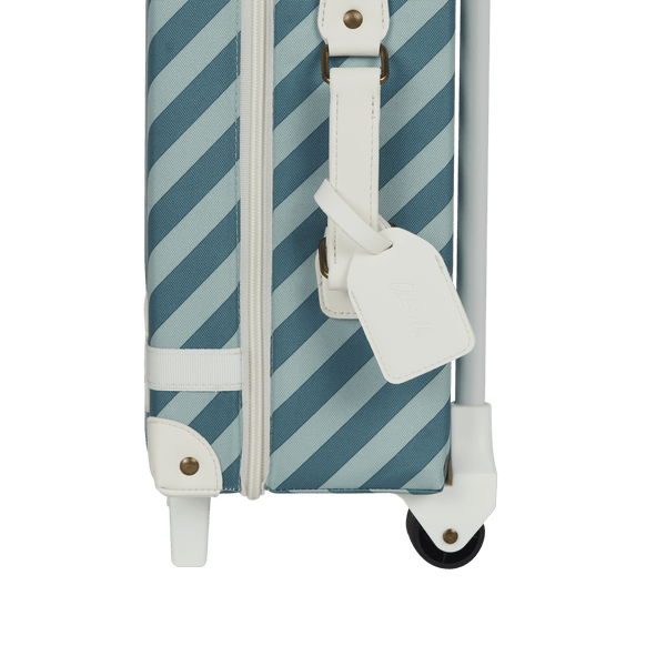 Charming blue striped kids travel suitcase by Olli Ella. Ideal for children's travel, with a spacious interior and playful colours. Constructed from recycled plastic bottles