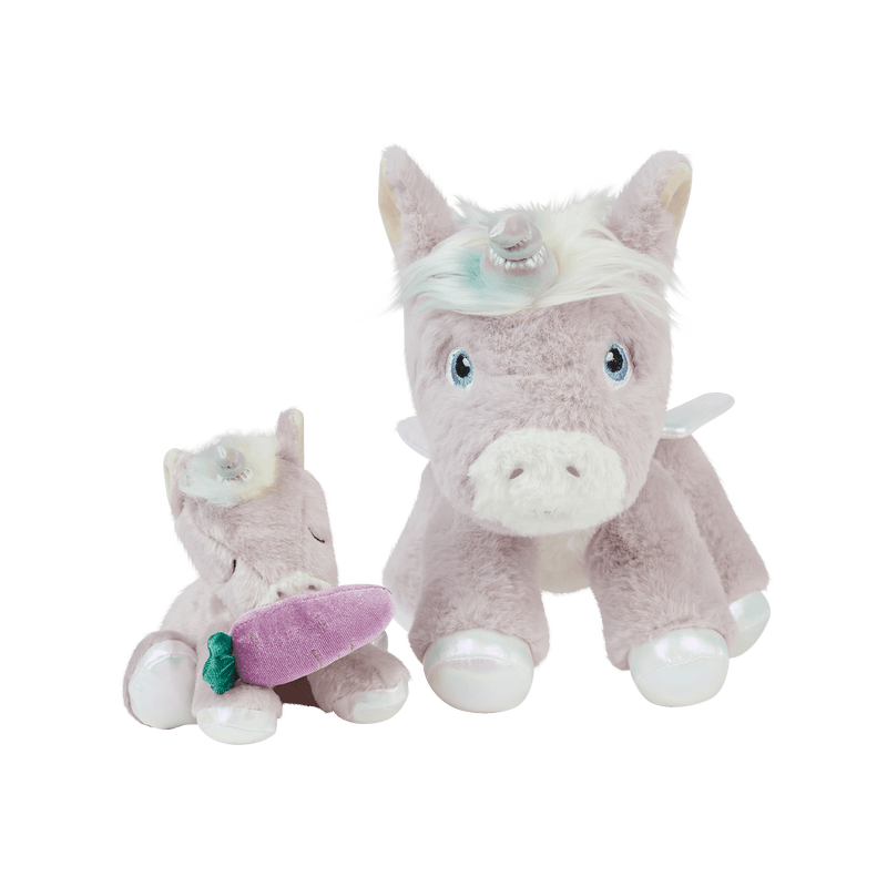 Dinkum Pets plush unicorn toys with a small purple carrot accessory, featuring a larger unicorn beside a smaller seated unicorn for imaginative play.