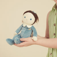 A limited-edition palm-sized plush toy, perfectly weighted in all the right places, and outfitted in a snuggly plush velvety blueberry suit.