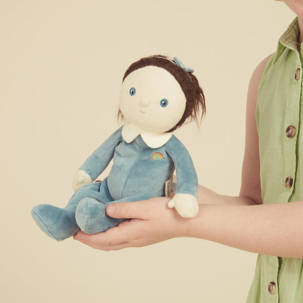 A limited-edition palm-sized plush toy, perfectly weighted in all the right places, and outfitted in a snuggly plush velvety blueberry suit.