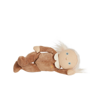 A limited-edition palm-sized plush toy, perfectly weighted in all the right places, and outfitted in a snuggly plush velvety Coconut suit.