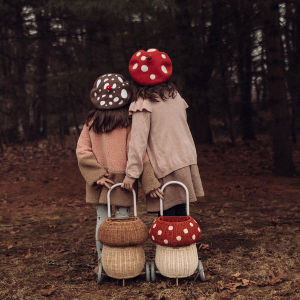 Whimsical natural mushroom basket on wheels. This 100% Handwoven Rattan wheeled basket is ideal for storing and toting around prized possessions! 