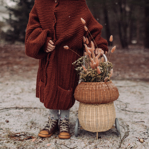 Whimsical natural mushroom basket on wheels. This 100% Handwoven Rattan wheeled basket is ideal for storing and toting around prized possessions! 